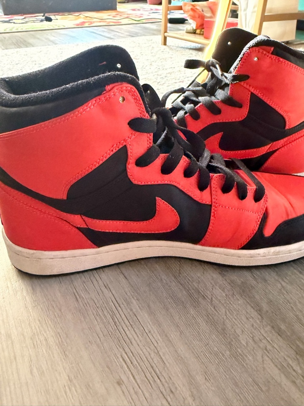 Jordan Black and Orange Retro Sneakers